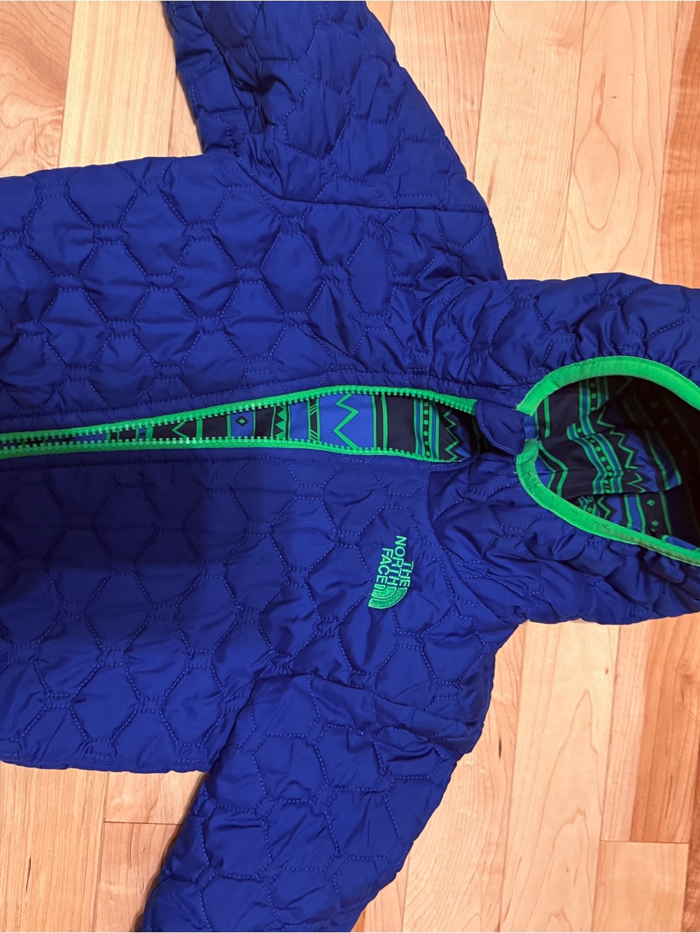 The North Face Kids Blue Puffer Jacket with Green Trim